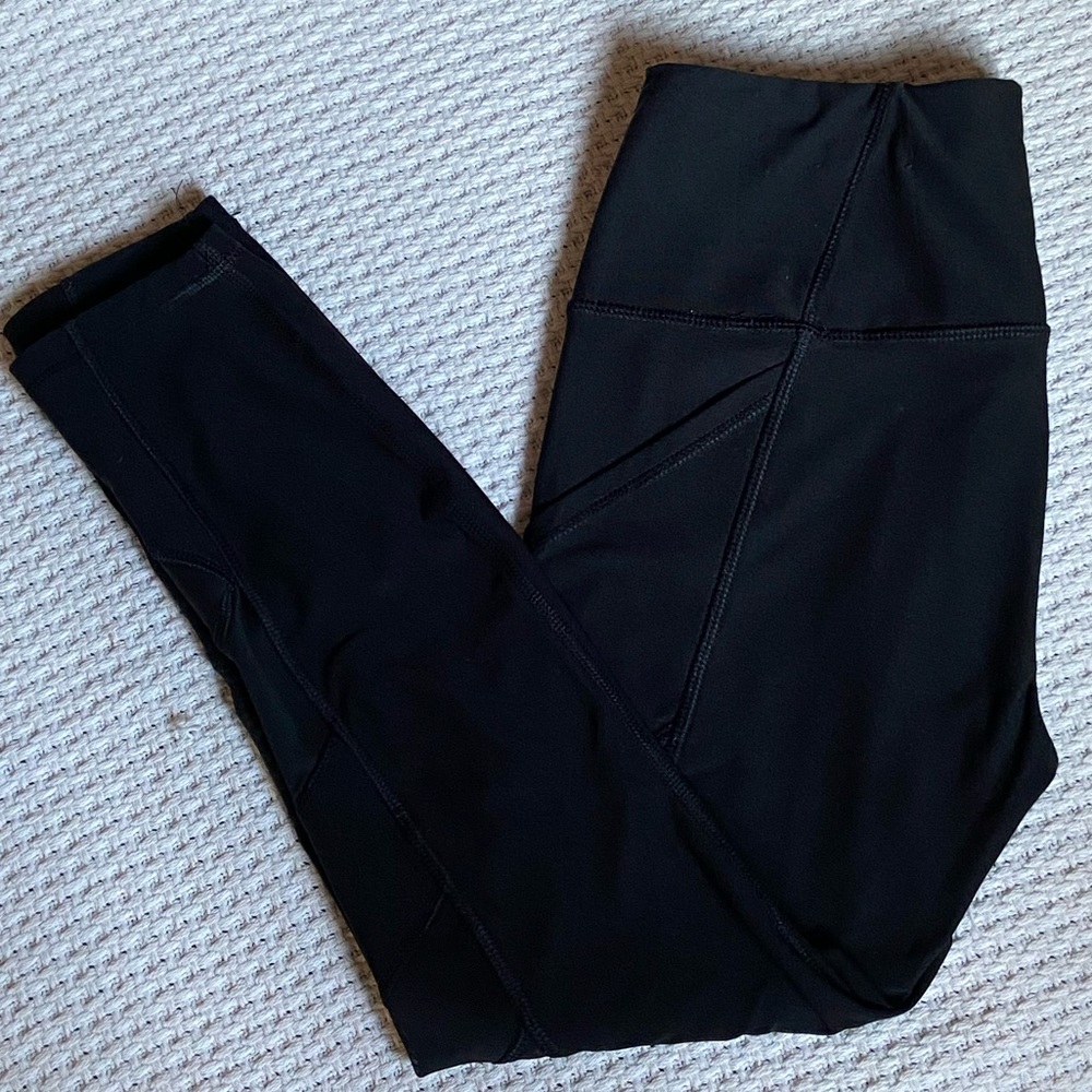 Black RBX leggings with transparent patches
